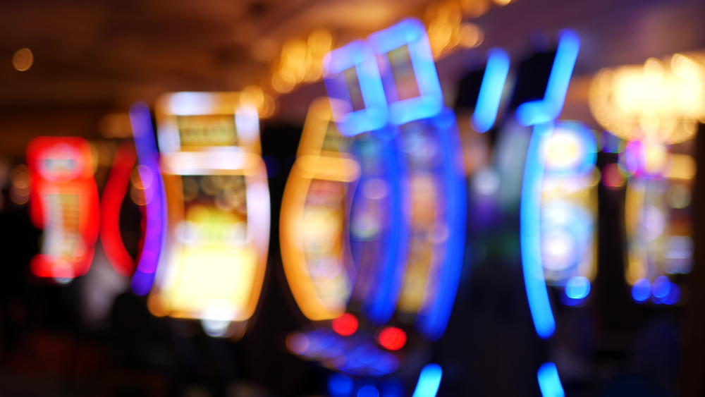 Defocused,Slot,Machines,Glow,In,Casino,On,Fabulous,Las,Vegas